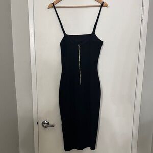 Lulu's Sleek Black Midi Dress with Gold Accent